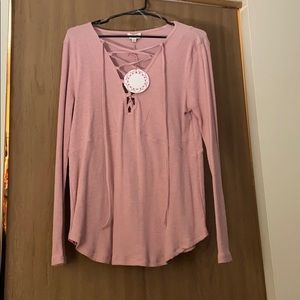 Pale pink shirt (tunic in style)